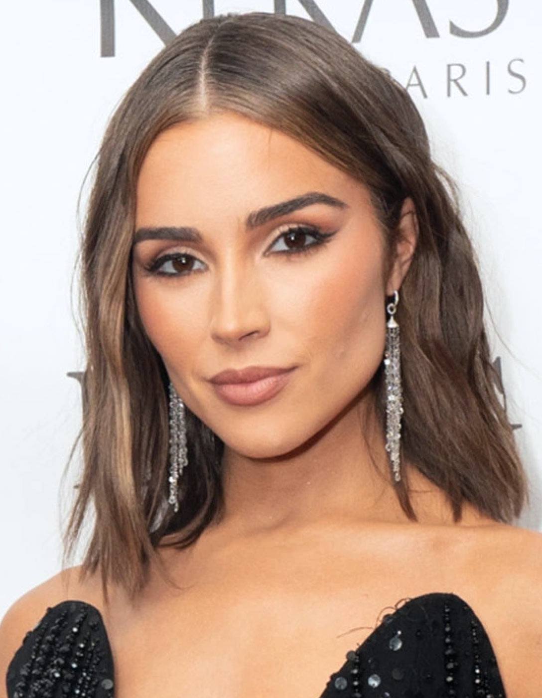Image of Olivia Culpo wearing 64facets diamond tassel earrings 