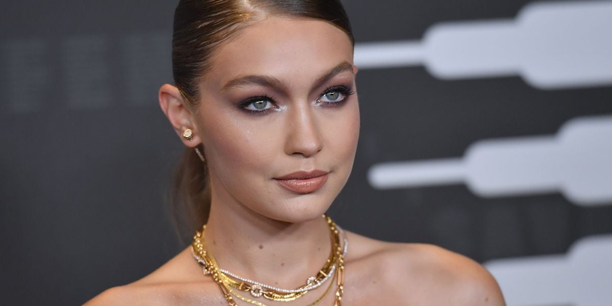 Hailey Bieber layering her necklaces