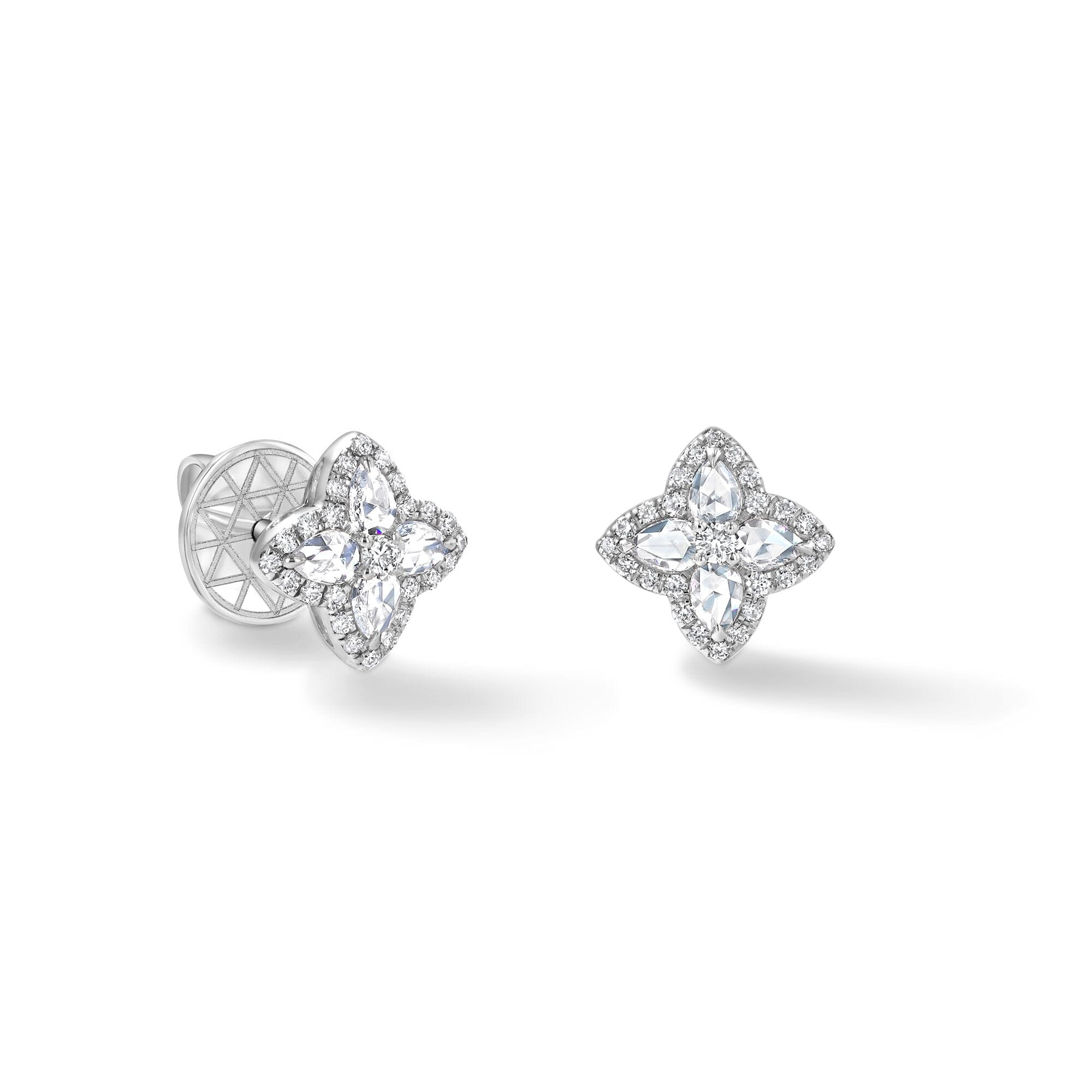 Image of 64facets diamond stud earrings in the shape of blossoms set in 18k gold