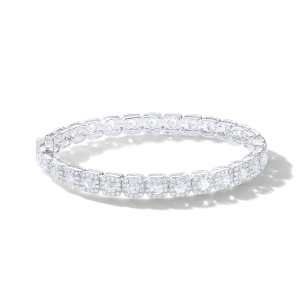 Diamond Bangle Bracelet. Rose cut diamonds are accented by micro pave brilliant cut diamonds in a cushion shape. 