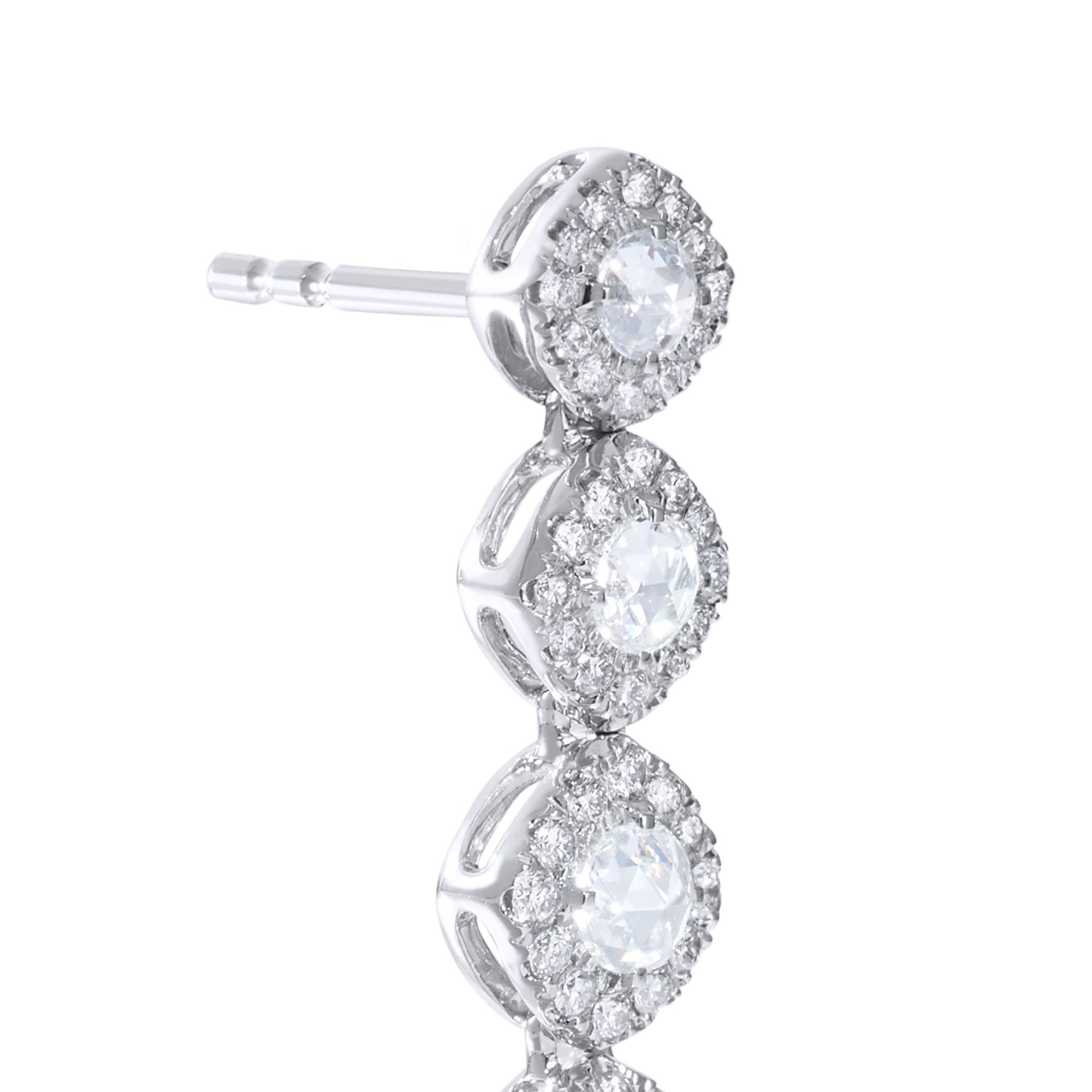 Image of Diamond dangle earrings close up. Rose cut diamonds with brilliant cut diamonds in a micro pave setting. 