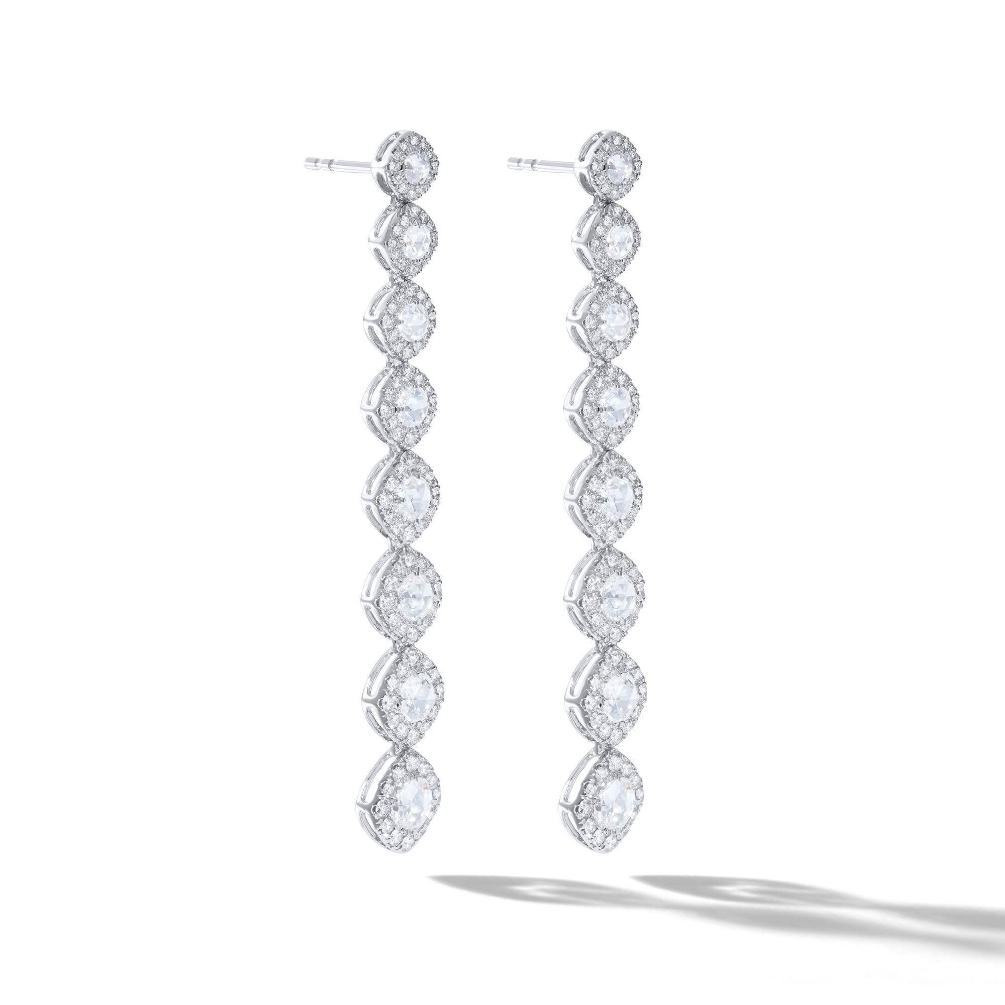 Image of Diamond dangle earrings. Rose cut diamonds with brilliant cut diamonds in a micro pave setting. 