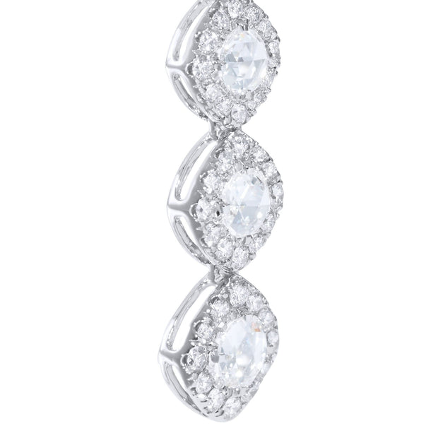 Diamond dangle earrings in close up. Rose cut diamonds with brilliant cut diamonds in a micro pave setting. 