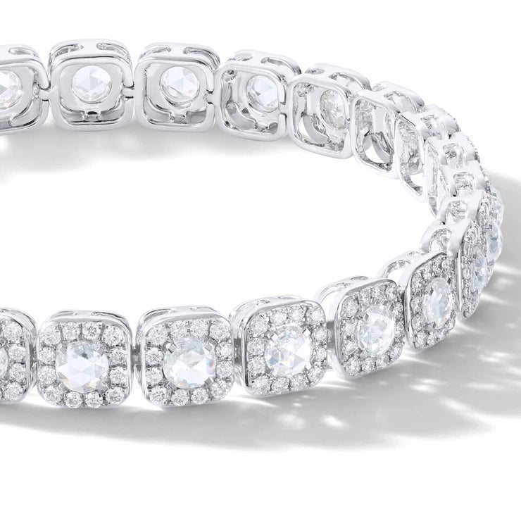 Diamond Tennis Bracelet. Rose cut diamonds accented by micro pave accents in a cushion shape. 