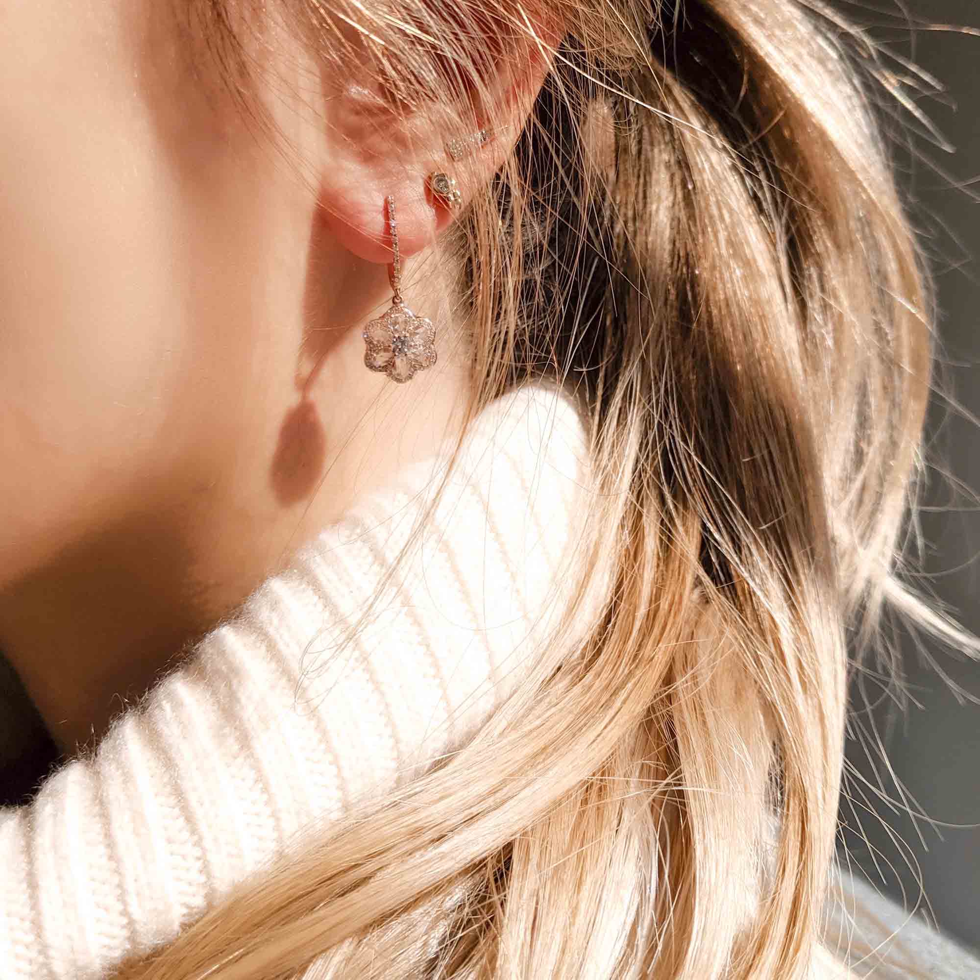 Image of Diamond Floral Earrings. Flower Shaped Diamond Drop Dangly Earrings made with Rose Cut Diamonds in 18K Rose Gold