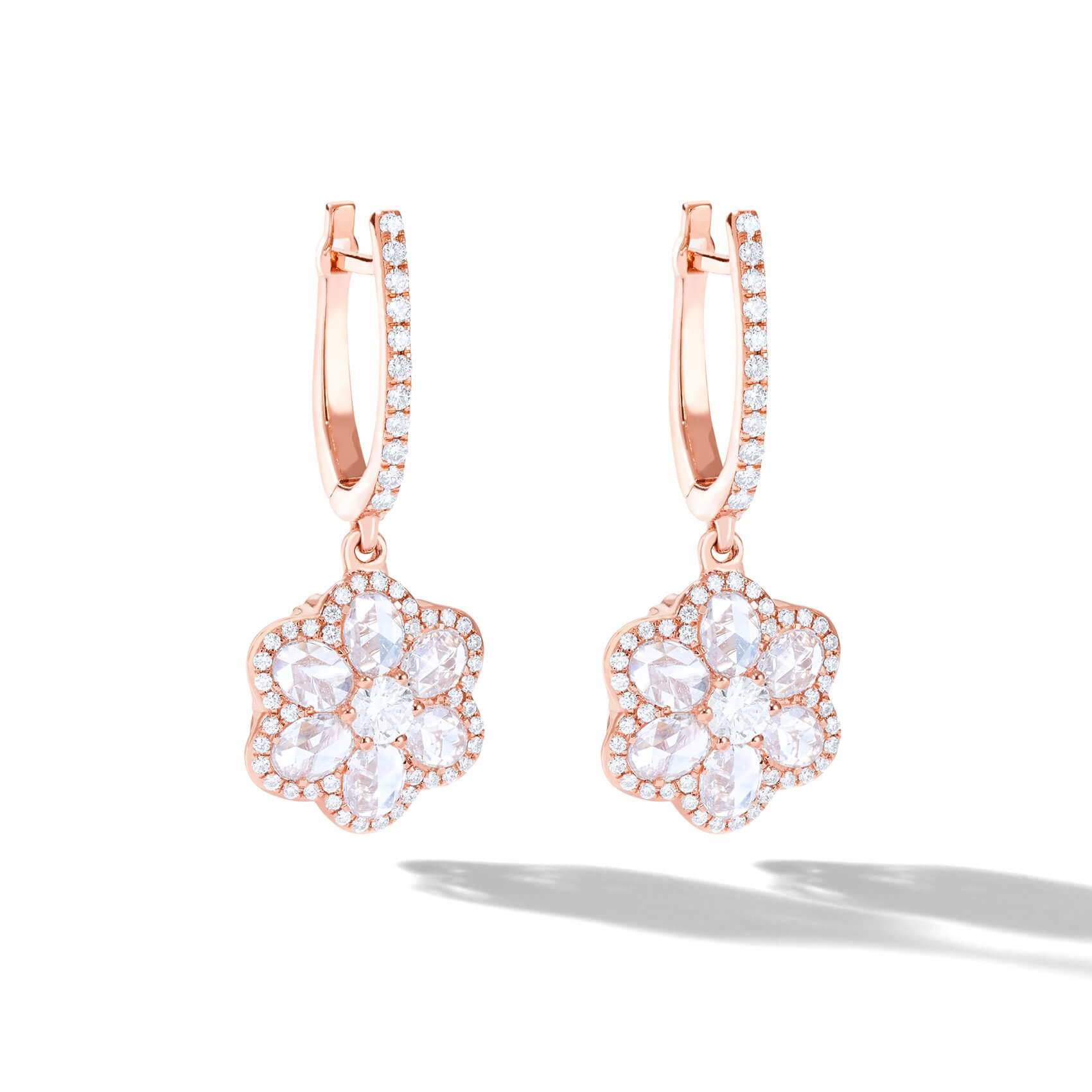Image of Gold and diamond earrings in the shape of a flower 