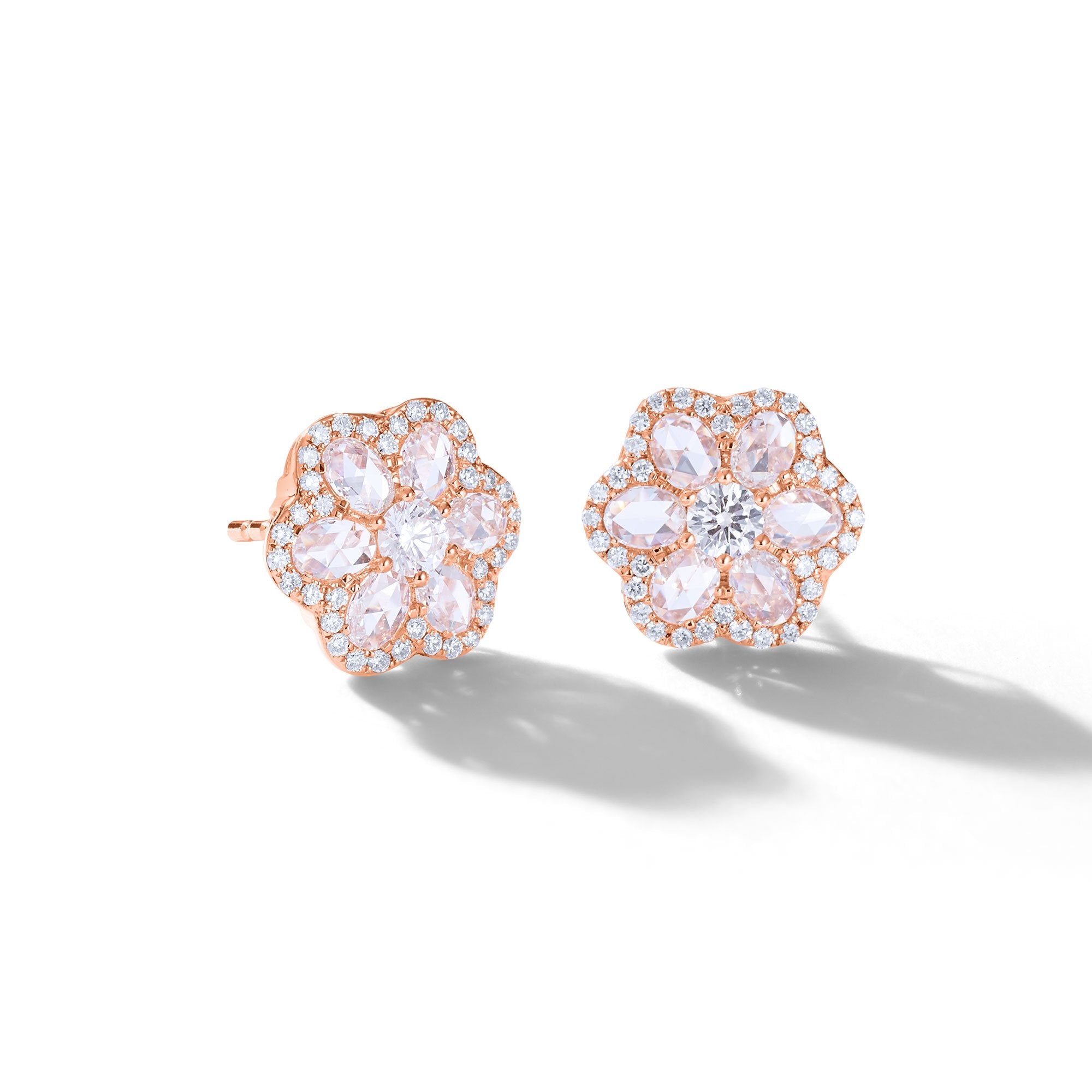 Image of 64facets diamond stud earrings in the shape of a flower set in rose gold