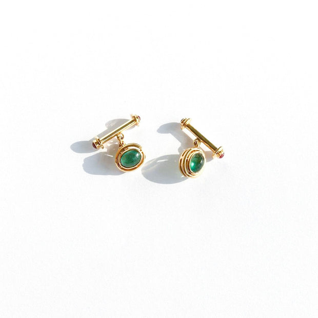 64faces emerald and ruby cabochon cufflinks set in 18k gold