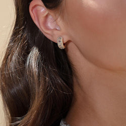 Image of 64Facets linear diamond huggie earrings made with rose cut diamonds and pave diamond accents and set in 18k gold