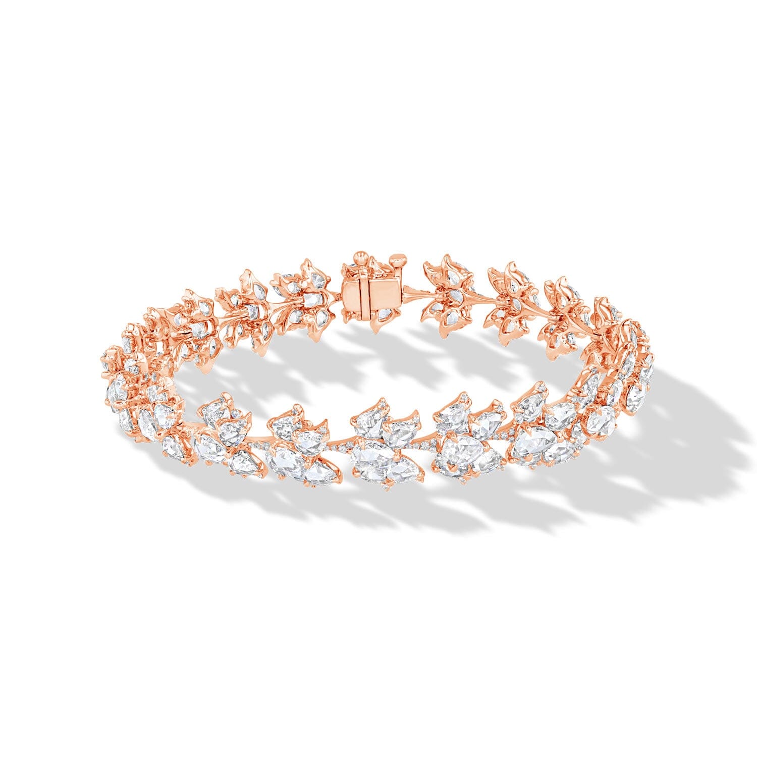Image of 64facets diamond bracelet in the shape of lotus flowers and set in 18k gold