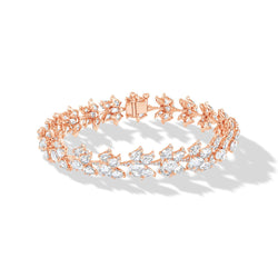 Image of 64facets diamond bracelet in the shape of lotus flowers and set in 18k gold