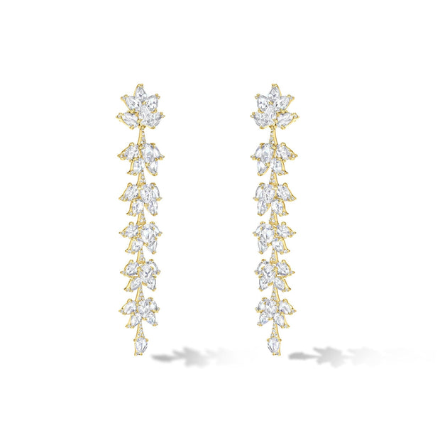 64facets diamond dangle earrings made with diamonds in the shape of lotus flowers and set in 18k gold