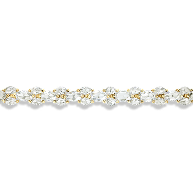 64facets diamond tennis bracelet made with marquise shaped rose cut diamonds and set in 18k gold