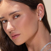 64Facets Diamond Huggie Earrings in three gold tones made with brilliant cut diamonds in a pave setting