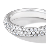 64Facets diamond band with brilliant cut diamonds in a pave setting in 18K gold