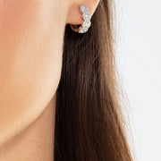 64facets diamond and white gold huggie earring