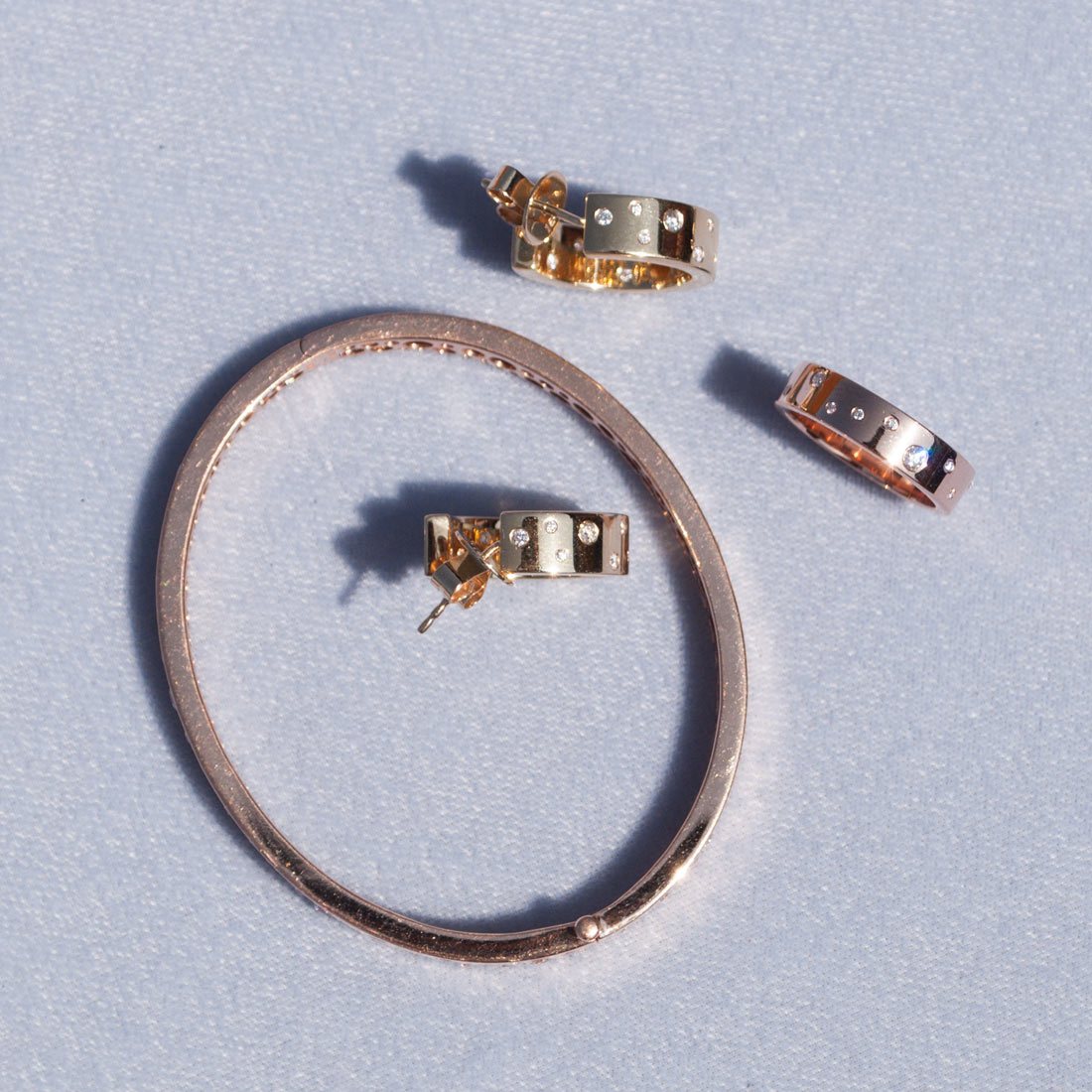 Image of 64facets astral gold and diamond bangle earrings and ring