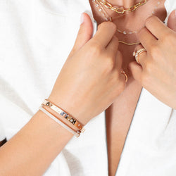 Image of 64Facets Stardust Adtral Bangle paired with a pave diamond bangle