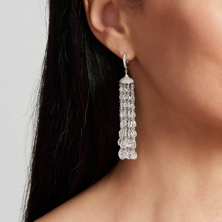 Earrings with sold tassels and diamonds