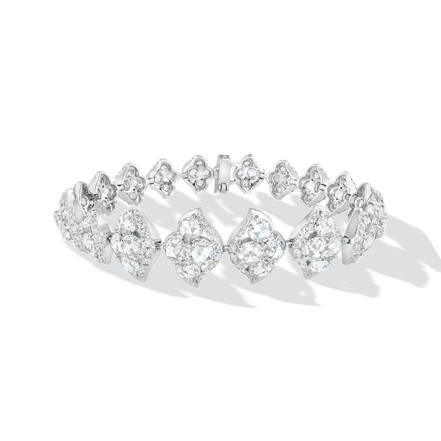 64Facets Tulip diamond tennis bracelet made with rose cut diamonds, pave diamonds and set in 18k gold in the shape of a tulip flower.