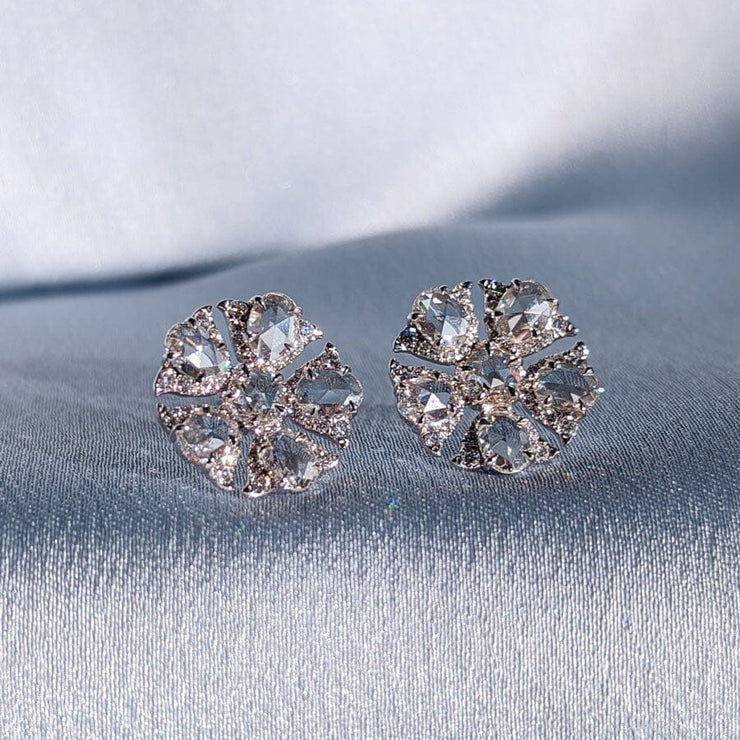 64facets rose cut diamond stud earrings in the shape of tulip flowers and set in 18k gold
